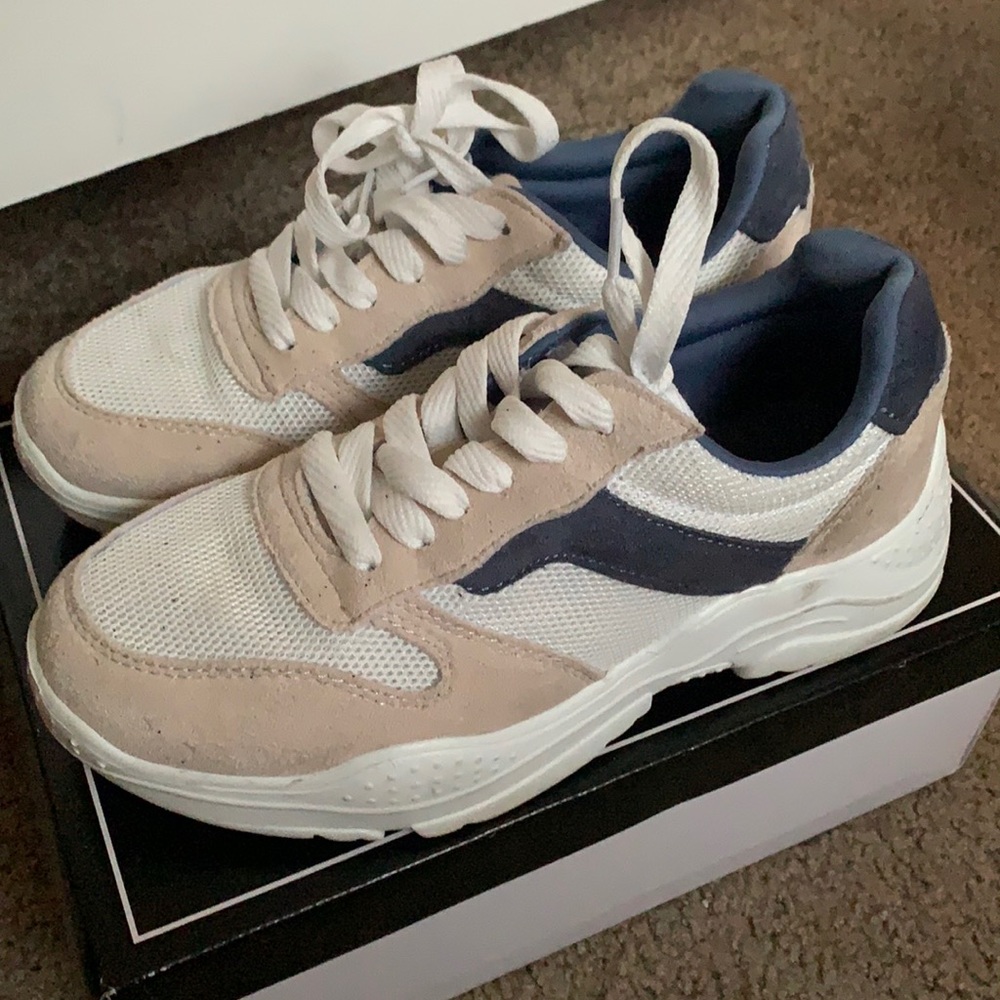 white and tan sneakers